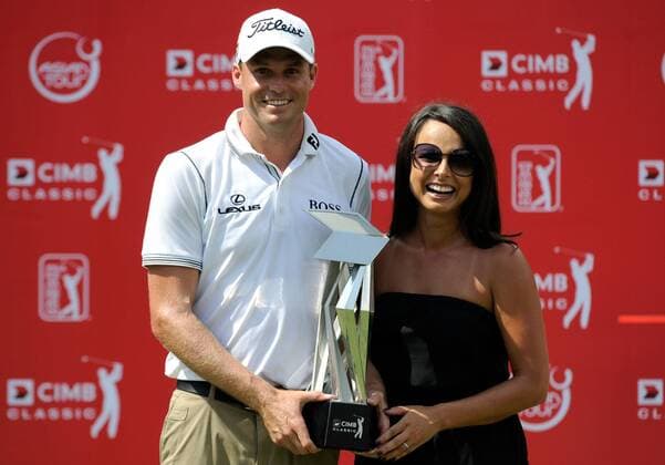 Oct. 28, 2012 - Kuala Lumpur, Malaysia - NICK WATNEY (L) of the U.S. poses with the winners trophy with his wife AMBE (R) after winning the CIMB Classic golf tournament at the Mines Resort and Golf Club in Kuala Lumpur. Golf 2012 - CIMB Classic - Day 4 - ZUMAz93