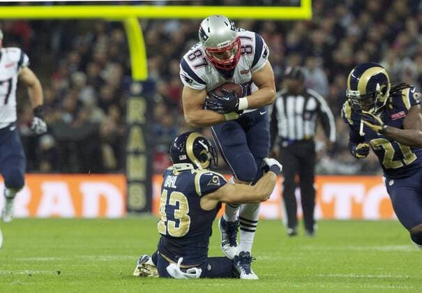 28.10.2012 London, England. NE Patriots TE Rob Gronkowski is tackled by Rams G Harvey Dahl during the NFL American Football Herren USA International Series 2012 game between The Bill Belichick and Tom Brady led New England Patriots and The St Louis Rams from Wembley Stadium. xMarkxDavisonx  ActionPlus20277022