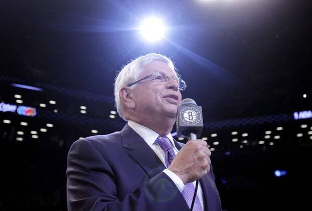 NBA commissioner David Stern speaks to the fans before the Brooklyn Nets play the Toronto Raptors in the first regular season game ever for the Nets at the Barclays Center in New York City on November 3, 2012.  NYP201210203143