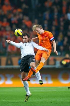 (L-R) Mats Hummels of Germany, Dirk Kuyt of Holland during the Friendly match between Holland and Germany at the Amsterdam Arena on November 14, 2012 in Amsterdam, The Netherlands. Holland v Germany Friendly 2012 2013 xVIxxIVx 1245860