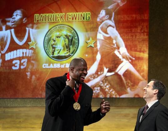 Nov. 18, 2012 - Kansas City, MO, USA - Inductee Patrick Ewing, left, and emcee Matt Winer share a laugh after the Georgetown great was presented his medal during the National Collegiate Basketball Hall of Fame on Sunday, November 18, 2012, in Kansas City, Missouri. CBE Hall of Fame - ZUMAm67