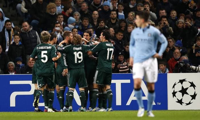 MANCHESTER, Nov. 21, 2012 -- Players of Real Madrid celebrate after scoring during the UEFA Champions League Group D match between Manchester City and Real Madrid at Etihad Stadium in Manchester, Britain, on Nov. 21, 2012. The match ended with a 1-1 draw. (Xinhua Wang Lili) (jyc) BRITAIN-MANCHESTER-SOCCER-UEFA CHAMPIONS LEAGUE-MANCHESTER CITY VS REAL MADRID 