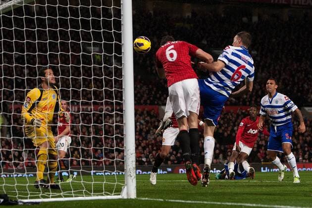 Football - 2012 2013 Premier League - Manchester United vs. (QPR) Queens Park Rangers (QPR) Jonny Evans of Manchester United scores the equalising goal at Old Trafford 