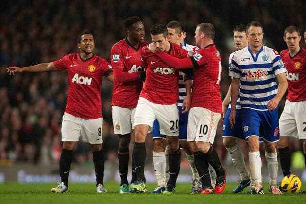 Football - 2012 2013 Premier League - Manchester United vs. (QPR) Queens Park Rangers (QPR) Wayne Rooney and Danny Welbeck restrain Robin van Persie of Manchester United following a bust up with QPR s Shaun Derry at Old Trafford 