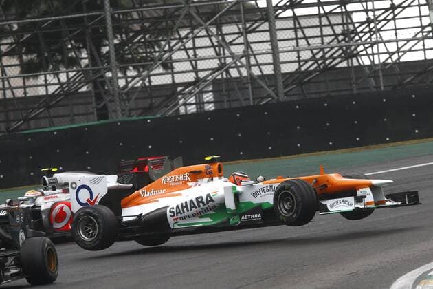 Motorsports: FIA Formula One World Championship 2012, Grand Prix of Brazil, crash between 12 Nico Hülkenberg (GER, Sahara Force India F1 Team) and 4 Lewis Hamilton (GBR, Vodafone McLaren Mercedes), xHOCHxZWEIx