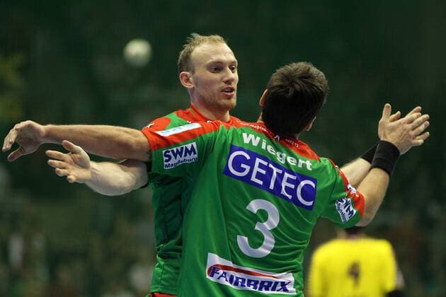 27.11.2012, Magdeburg, Sachsen-Anhalt, DEU - Handballspiel SC Magdeburg gegen Füchse Berlin in der GETEC-Arena, Torjubel: Yves Grafenhorst (Magdeburg, 15), Bennet Wiegert ( Magdeburg, 3), 190D271112SCM-Berlin.jpg,