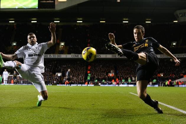 Football - Premier League - Tottenham Hotspur vs Liverpool FC Liverpool s Stewart Downing crosses while Tottenham s Kyle Walker attempts to block at White Hart Lane, London 