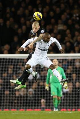 Football - Premier League - Tottenham Hotspur vs Liverpool FC Liverpool s Martin Skrtel and Tottenham s Jermain Defoe at White Hart Lane, London 