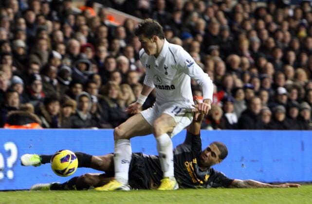 28.11.2012. North London, England. Glen Johnson of Liverpool tackles Gareth Bale of Tottenham Hotspur in action during the Premier League match between Tottenham Hotspur and Liverpool from White Hart Lane, London xKieranxGalvinx  ActionPlus11351920