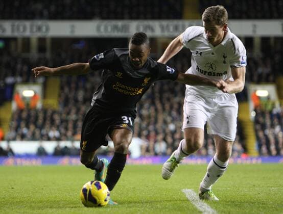 28.11.2012. North London, England. Raheem Sterling of Liverpool and Jan Vertonghen of Tottenham Hotspur in action during the Premier League match between Tottenham Hotspur and Liverpool from White Hart Lane, London xKieranxGalvinx  ActionPlus11351922