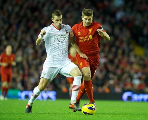PROPAGANDA20121201 Football - soccer: Barclays Premier League, Liverpool FC - Southampton FC, Liverpool s captain Steven Gerrard in action against Southampton s Morgan Schneiderlin during the Premiership match at Anfield. (Hinweis: Verwendung nur in Deutschland, Österreich oder Schweiz - only Germany, Austria and Switzerland) xHOCHxZWEIx xPropagandax