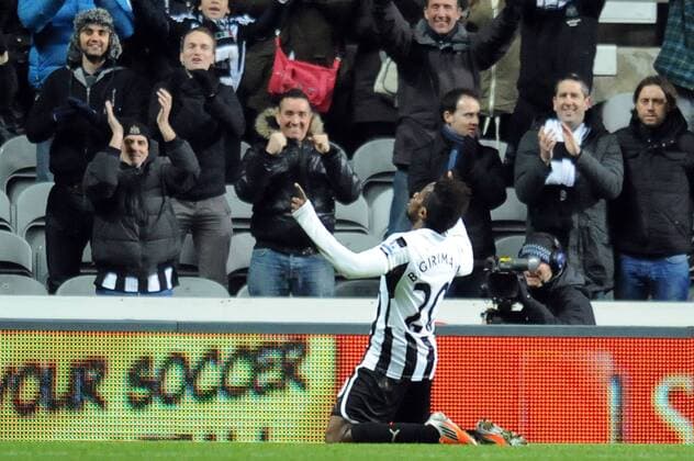 Football - Premier League - Newcastle United vs. Wigan Athletic Gael Bigirimana (Newcastle United) celebrates his goal at St James Park. 
