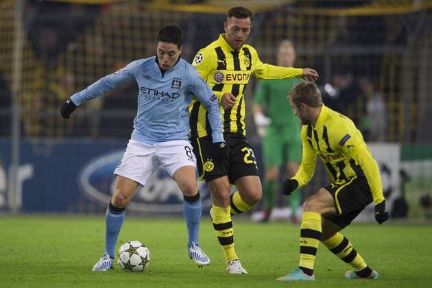 (L-R) Samir Nasri of Manchester City, Julian Schieber of Borussia Dortmund during the Champions League match between Borussia Dortmund and Manchester City at Signal Iduna Park on December 4, 2012 in Dortmund, Germany. Borussia Dortmund v Manchester City UEFA Champions League 2012 2013 xVIxMAURICExVANxSTEENxIVx 1284176