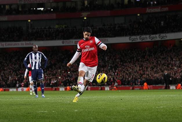 Arsenal s Mikel Arteta scoring his sides second goal from the penalty spot..Arsenal FC London v West Bromwich Albion - Premier League - Emirates Stadium, London- 8 12 12 - Picture David Klein Sportimage EDITORIAL USE ONLY. No use with unauthorised audio, video, data, fixture lists, club league logos or live services. Online in-match use limited to 120 images, no video emulation. No use in betting, games or single club league player publications.