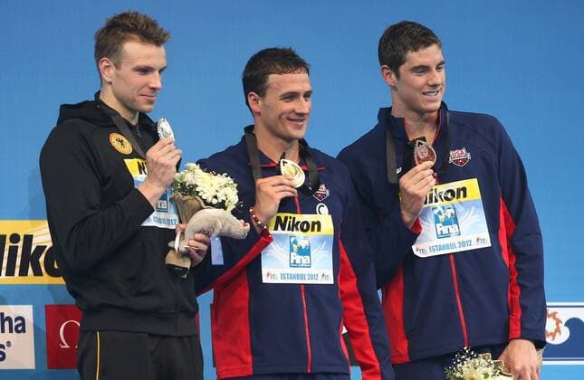 SCHWIMMEN - FINA Kurzbahn WM Istanbul ISTANBUL,TUERKEI,12.DEZ.12 - DIVERS, SCHWIMMEN - FINA Kurzbahn Weltmeisterschaft, 200m Freistil der Herren, Siegerehrung. Bild zeigt Paul Biedermann (GER), Ryan Lochte und Conor Dwyer (USA). Keyword: Medaillen. 