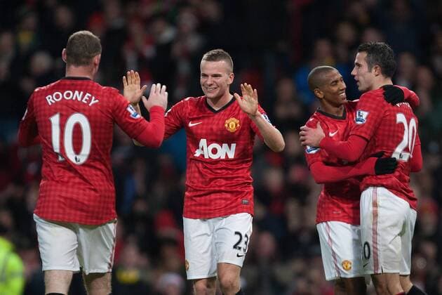 Football - 2012 2013 Premier League - Manchester United vs. AFC Sunderland Tom Cleverley of Manchester United congratulates Wayne Rooney and Robin van Persie on his at Old Trafford 
