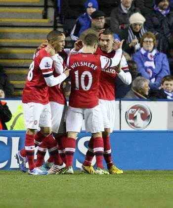 Football - 2012 2013 Premier League - Reading vs Arsenal Lukas Podolski of Arsenal celebrates scoring the opening goal at the Madejski Stadium Reading 