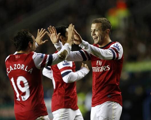 Arsenal s Jack Wilshere celebrates with goalscorer Santi Cazorla Reading v Arsenal - Premier League - Madejski Stadium, Reading- 17 12 12 - Picture David Klein Sportimage EDITORIAL USE ONLY. No use with unauthorised audio, video, data, fixture lists, club league logos or live services. Online in-match use limited to 120 images, no video emulation. No use in betting, games or single club league player publications.