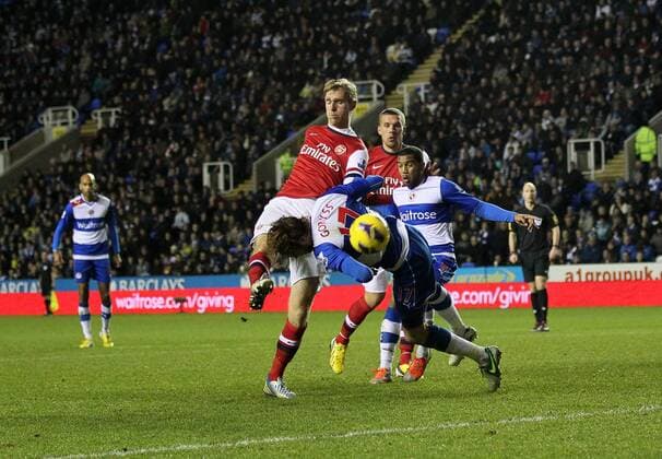 Arsenal s Per Mertesacker fires in a shot Reading v Arsenal - Premier League - Madejski Stadium, Reading- 17 12 12 - Picture David Klein Sportimage EDITORIAL USE ONLY. No use with unauthorised audio, video, data, fixture lists, club league logos or live services. Online in-match use limited to 120 images, no video emulation. No use in betting, games or single club league player publications.