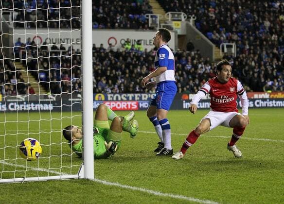 Arsenal s Santi Cazorla celebrates scoring his opening goal Reading v Arsenal - Premier League - Madejski Stadium, Reading- 17 12 12 - Picture David Klein Sportimage EDITORIAL USE ONLY. No use with unauthorised audio, video, data, fixture lists, club league logos or live services. Online in-match use limited to 120 images, no video emulation. No use in betting, games or single club league player publications.