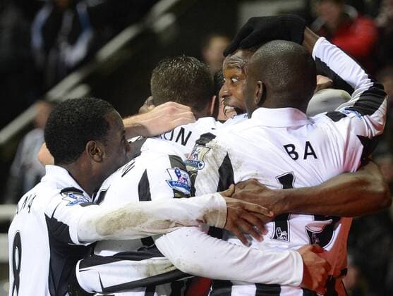 Newcastle United s Shola Ameobi celebrates scoring their first goal with team mates - Barclays Premier League - Newcastle United vs QPR Queens Park Rangers (QPR) - St. James Park - Newcastle United - 22 12 12 - Picture Richard Lee Sportimage EDITORIAL USE ONLY. No use with unauthorised audio, video, data, fixture lists, club league logos or live services. Online in-match use limited to 120 images, no video emulation. No use in betting, games or single club league player publications.