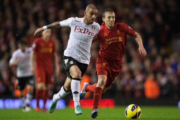 Football - 2012 2013 Premier League - Liverpool FC vs. Fulham FC - Lucas of Liverpool FC chases Ashkan Dejagah of Fulham FC at Anfield 