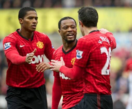 PROPAGANDA20121223 Football - soccer: Barclays Premier League, Swansea City FC - Manchester United FC, Manchester United s Patrice Evra celebrates scoring the first goal against Swansea City during the Premiership match at the Liberty Stadium. (Hinweis: Verwendung nur in Deutschland, Österreich oder Schweiz - only Germany, Austria and Switzerland) xHOCHxZWEIx xPropagandax 