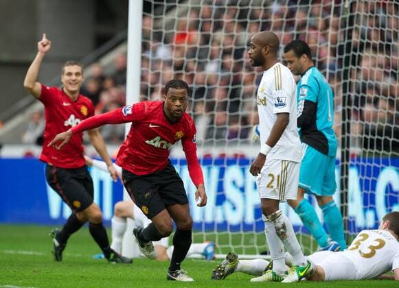 PROPAGANDA20121223 Football - soccer: Barclays Premier League, Swansea City FC - Manchester United FC, Manchester United s Patrice Evra celebrates scoring the first goal against Swansea City during the Premiership match at the Liberty Stadium. (Hinweis: Verwendung nur in Deutschland, Österreich oder Schweiz - only Germany, Austria and Switzerland) xHOCHxZWEIx xPropagandax 