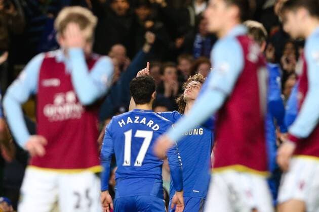 Football - 2012 2013 Premier League - Chelsea vs. Aston Villa Chelsea s David Luiz celebrates scoring at Stamford Bridge, London 
