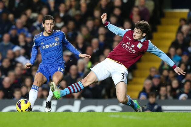 Football - 2012 2013 Premier League - Chelsea vs. Aston Villa Chelsea s Eden Hazard is fouled by Aston Villa s Chris Herd at Stamford Bridge, London 