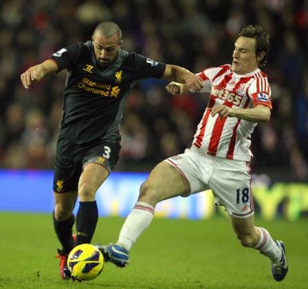 -Dean Whitehead of Stoke city battles with Liverpool s Jose Enrique Barclays Premier League - Stoke City vs Liverpool - Britannia Stadium - Stoke on Trent - 26th December 2012 - Credit Paul Bradbury Sportimage EDITORIAL USE ONLY. No use with unauthorised audio, video, data, fixture lists, club league logos or live services. Online in-match use limited to 120 images, no video emulation. No use in betting, games or single club league player publications.