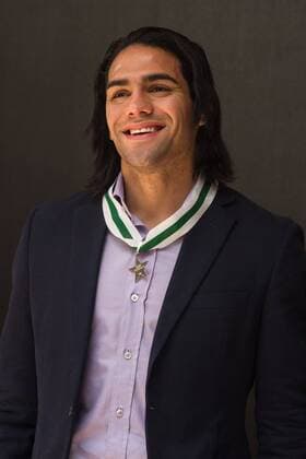 BOGOTA, Dec. 26, 2012 - Colombian soccer player Radamel Falcao Garcia smiles during an awarding ceremony in Bogota, capital of Colombia, on Dec. 26, 2012. Falcao Garcia received his Civic Award from Colombia s National Police in the ceremony Wednesday. (Xinhua Jhon Paz) (da) (sp) COLOMBIA-BOGOTA-GARCIA-AWARD 