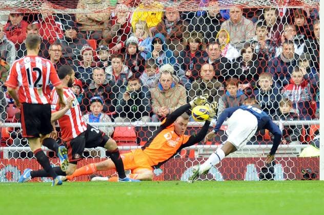 Football - 2012 2013 Premier League - Sunderland vs. Tottenham Hotspur Simon Mignolet (Sunderland) makes a great save from Jermain Defoe (Spurs) at the Stadium of Light 