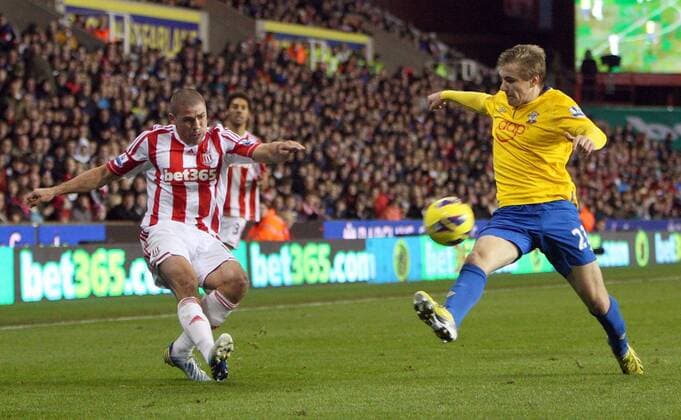 Stoke s Jon Walters get the ball past Southampton s Guly Do Prado- Barclays Premier League - Stoke City vs Southampton - Britannia Stadium - Stoke on Trent - 29th December 2012 - Credit Paul Bradbury Sportimage EDITORIAL USE ONLY. No use with unauthorised audio, video, data, fixture lists, club league logos or live services. Online in-match use limited to 120 images, no video emulation. No use in betting, games or single club league player publications.