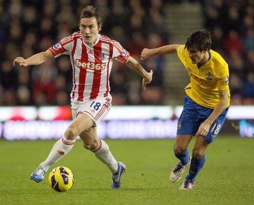 Stoke s Dean Whitehead battles with Southampton s Jack Cork- Barclays Premier League - Stoke City vs Southampton - Britannia Stadium - Stoke on Trent - 29th December 2012 - Credit Paul Bradbury Sportimage EDITORIAL USE ONLY. No use with unauthorised audio, video, data, fixture lists, club league logos or live services. Online in-match use limited to 120 images, no video emulation. No use in betting, games or single club league player publications.