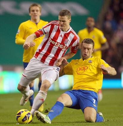 Stoke City s Robert Huth battles with Southampton s Ricky Lambert- Barclays Premier League - Stoke City vs Southampton - Britannia Stadium - Stoke on Trent - 29th December 2012 - Credit Paul Bradbury Sportimage EDITORIAL USE ONLY. No use with unauthorised audio, video, data, fixture lists, club league logos or live services. Online in-match use limited to 120 images, no video emulation. No use in betting, games or single club league player publications.