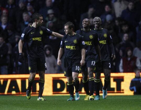 Football- Premier League-Aston Villa vs. Wigan Athletic- Wigan goal scorers Emerson Boyce and Arouna Kone celebrate at Villa Park 