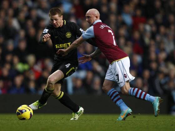 Football- Premier League-Aston Villa vs. Wigan Athletic- Aston Villa s Stephen Ireland fouls Wigan s James McCarthy at Villa Park 