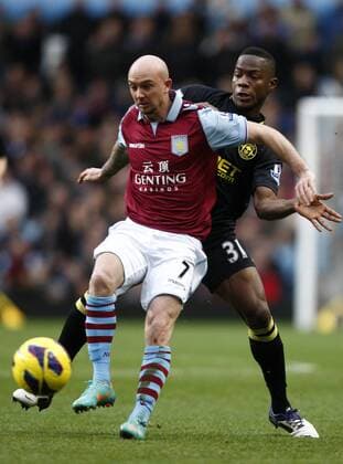 Football- Premier League-Aston Villa vs. Wigan Athletic- Aston Villa s Stephen Ireland and Wigan s Emerson Boyce battle at Villa Park 