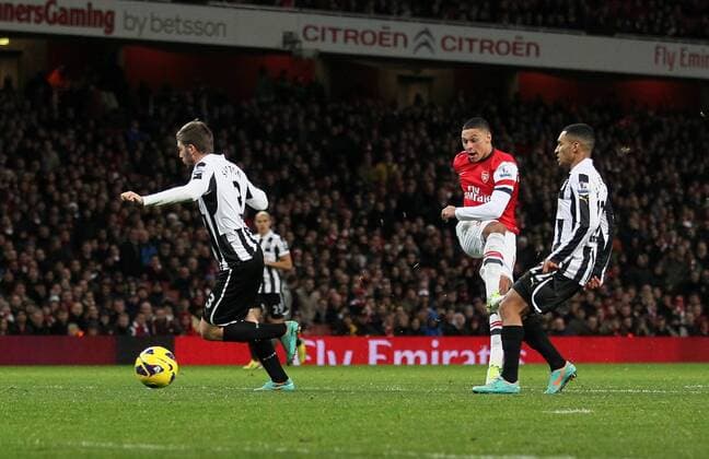Arsenal s Alex Oxlade-Chamberlain scoring his sides second goal..- Arsenal v Newcastle United - Barclays Premier League - the Emirates Stadium, London- 29 12 12 - Picture David Klein Sportimage EDITORIAL USE ONLY. No use with unauthorised audio, video, data, fixture lists, club league logos or live services. Online in-match use limited to 120 images, no video emulation. No use in betting, games or single club league player publications.