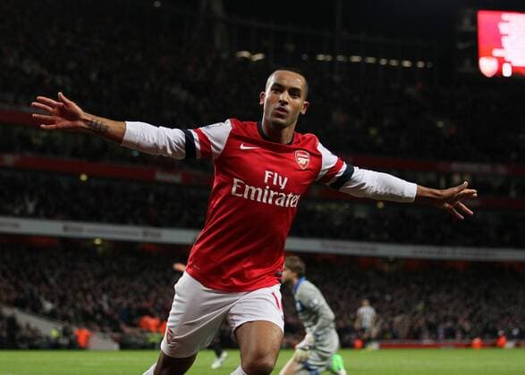 Arsenal s Theo Walcott celebrates scoring his sides opening goal..- Arsenal v Newcastle United - Barclays Premier League - the Emirates Stadium, London- 29 12 12 - Picture David Klein Sportimage EDITORIAL USE ONLY. No use with unauthorised audio, video, data, fixture lists, club league logos or live services. Online in-match use limited to 120 images, no video emulation. No use in betting, games or single club league player publications.