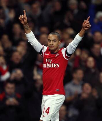 Arsenal s Theo Walcott celebrates scoring his sides fourth goal..- Arsenal v Newcastle United - Barclays Premier League - the Emirates Stadium, London- 29 12 12 - Picture David Klein Sportimage EDITORIAL USE ONLY. No use with unauthorised audio, video, data, fixture lists, club league logos or live services. Online in-match use limited to 120 images, no video emulation. No use in betting, games or single club league player publications.