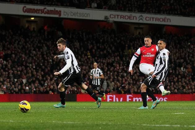 Arsenal s Alex Oxlade-Chamberlain scoring his sides second goal..- Arsenal v Newcastle United - Barclays Premier League - the Emirates Stadium, London- 29 12 12 - Picture David Klein Sportimage EDITORIAL USE ONLY. No use with unauthorised audio, video, data, fixture lists, club league logos or live services. Online in-match use limited to 120 images, no video emulation. No use in betting, games or single club league player publications.