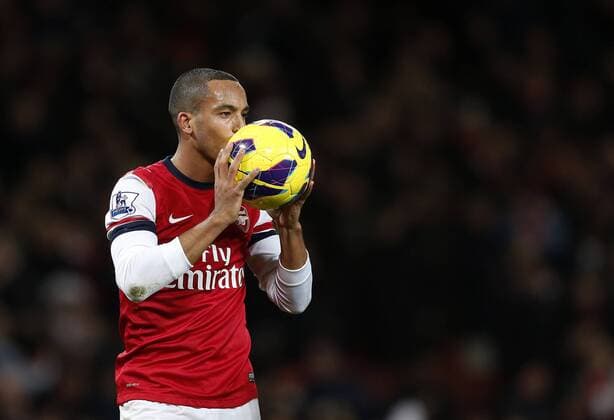 Arsenal s Theo Walcott celebrates with the match ball after his hatrick..- Arsenal v Newcastle United - Barclays Premier League - the Emirates Stadium, London- 29 12 12 - Picture David Klein Sportimage EDITORIAL USE ONLY. No use with unauthorised audio, video, data, fixture lists, club league logos or live services. Online in-match use limited to 120 images, no video emulation. No use in betting, games or single club league player publications.