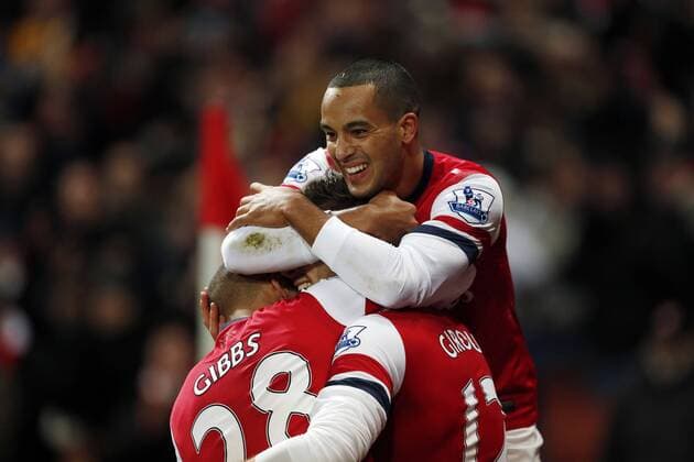 Arsenal s Theo Walcott celebrates his sides sixth goal..- Arsenal v Newcastle United - Barclays Premier League - the Emirates Stadium, London- 29 12 12 - Picture David Klein Sportimage EDITORIAL USE ONLY. No use with unauthorised audio, video, data, fixture lists, club league logos or live services. Online in-match use limited to 120 images, no video emulation. No use in betting, games or single club league player publications.