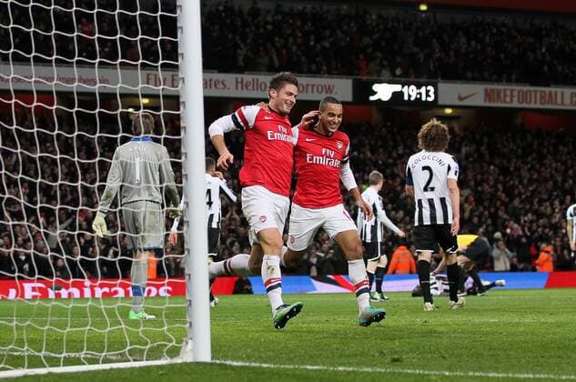 Arsenal s Olivier Giroud celebrates scoring his sides fifth goal with Theo Walcott..- Arsenal v Newcastle United - Barclays Premier League - the Emirates Stadium, London- 29 12 12 - Picture David Klein Sportimage EDITORIAL USE ONLY. No use with unauthorised audio, video, data, fixture lists, club league logos or live services. Online in-match use limited to 120 images, no video emulation. No use in betting, games or single club league player publications.
