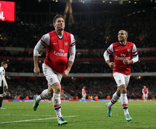 Arsenal s Olivier Giroud celebrates scoring his sides fifth goal with Theo Walcott..- Arsenal v Newcastle United - Barclays Premier League - the Emirates Stadium, London- 29 12 12 - Picture David Klein Sportimage EDITORIAL USE ONLY. No use with unauthorised audio, video, data, fixture lists, club league logos or live services. Online in-match use limited to 120 images, no video emulation. No use in betting, games or single club league player publications.