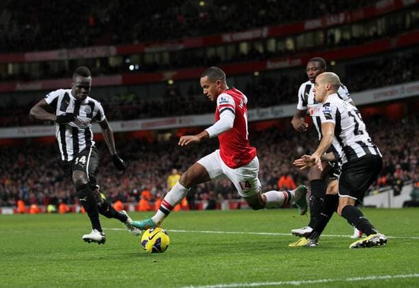 Arsenal s Theo Walcott in full flow..- Arsenal v Newcastle United - Barclays Premier League - the Emirates Stadium, London- 29 12 12 - Picture David Klein Sportimage EDITORIAL USE ONLY. No use with unauthorised audio, video, data, fixture lists, club league logos or live services. Online in-match use limited to 120 images, no video emulation. No use in betting, games or single club league player publications.