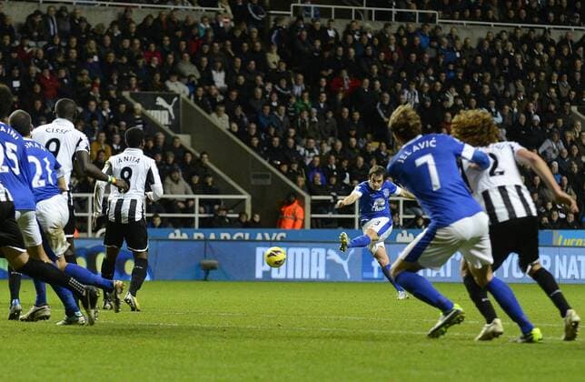 Leighton Baines of Everton (C) scores their first goal - Barclays Premier League - Newcastle United vs Everton - St. James Park - Newcastle - 02 01 13 - Picture Richard Lee Sportimage EDITORIAL USE ONLY. No use with unauthorised audio, video, data, fixture lists, club league logos or live services. Online in-match use limited to 120 images, no video emulation. No use in betting, games or single club league player publications.