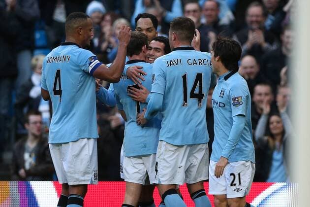 Football - 2012 2013 FA Cup - Third Round: Manchester City vs. Watford FC Manchester City s Carlos Tevez celebrates scoring at Etihad Stadium, Manchester 